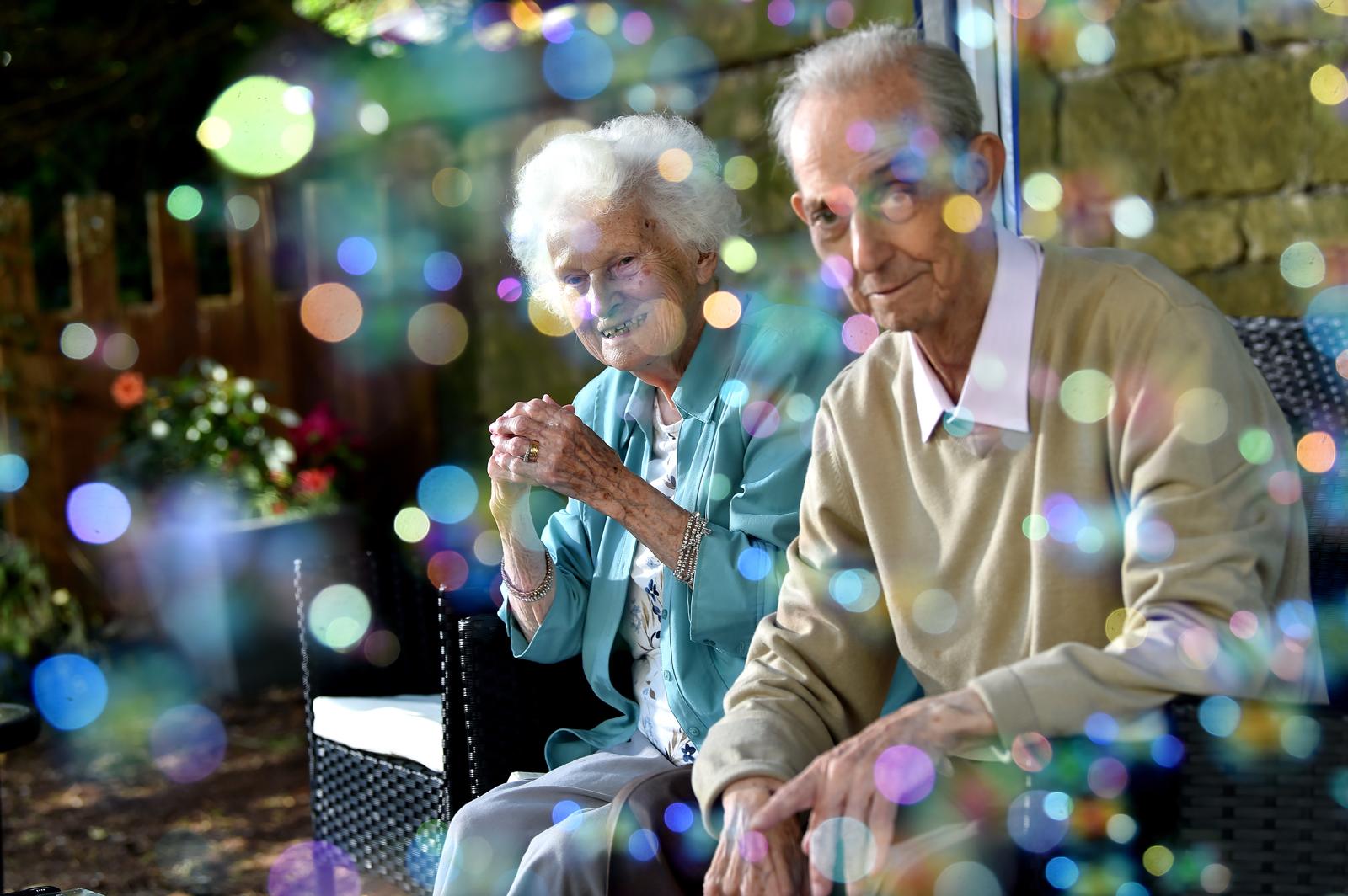 A carer and resident discussing a care plan