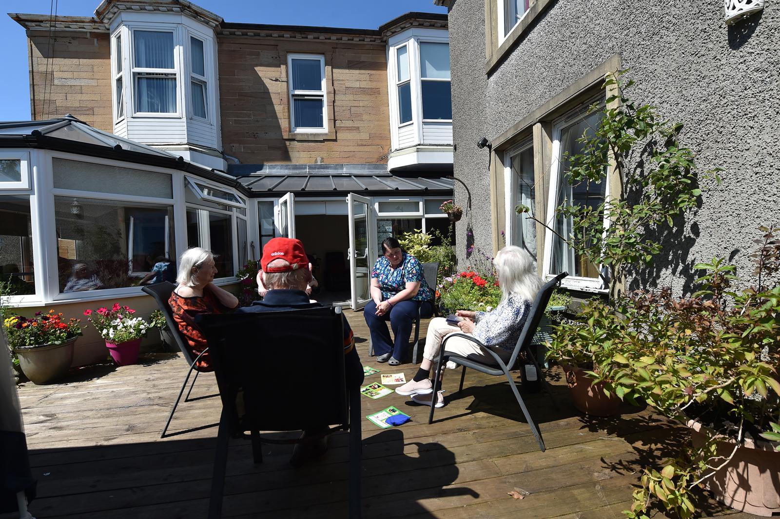 A nurse checking on a resident's wellbeing